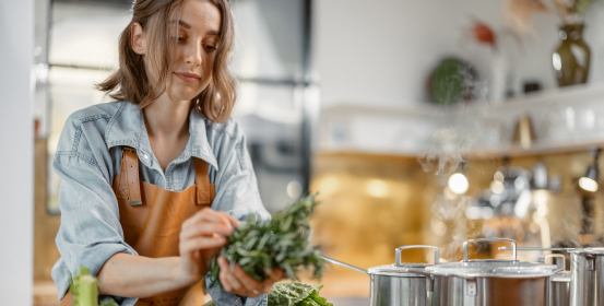 women cooking healthy meal in the kitchen